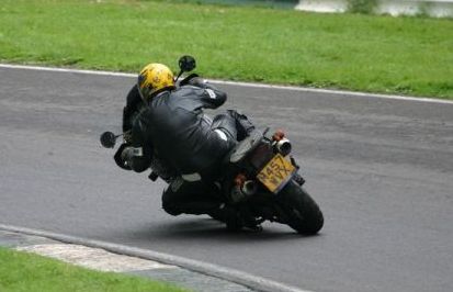 mike of distant earth solihull midlands rock covers band riding triumph tiger round cadwell park